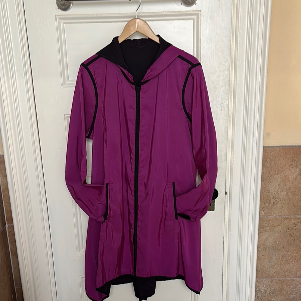 Mycra Pac mid-length jacket. Magenta w/Black Accent reverses to all Black